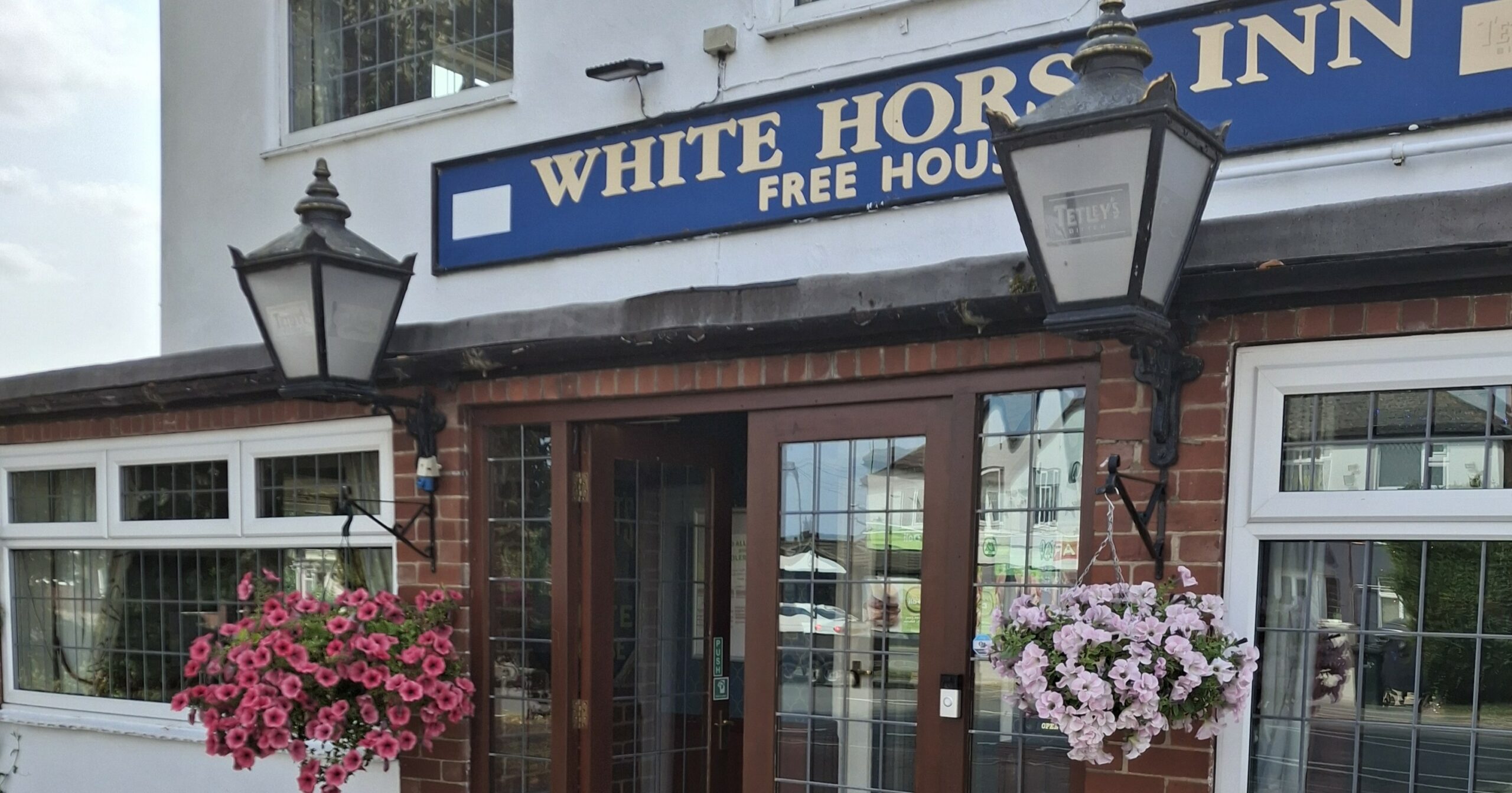 White Horse Inn Sold to New Entrant Banner